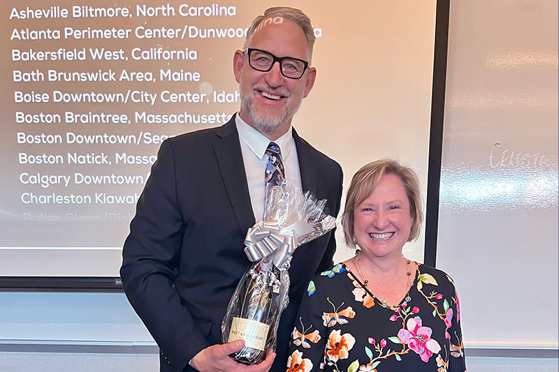 Tim Ostem, Area General Manager, Atlific Hotels and General Manager, Residence Inn Calgary Downtown/ Beltline and Wendy Lamont, Executive Vice President Atlific Hotels celebrate wins in the  2023 Global Performance Awards.